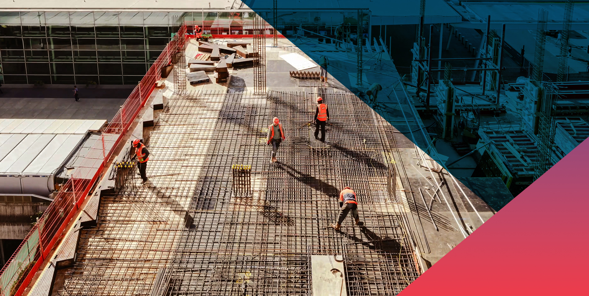 Aerial view of construction workers in safety vests and hard hats installing a dense steel rebar grid